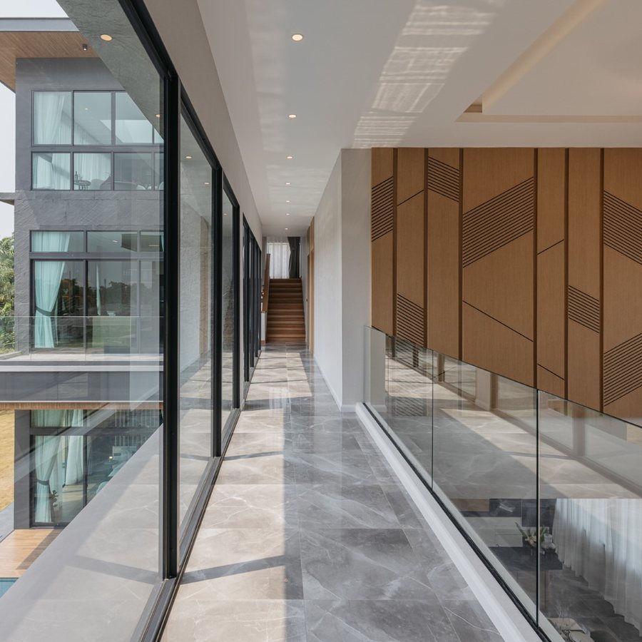Sylva — upper-floor corridor overlooking the pool